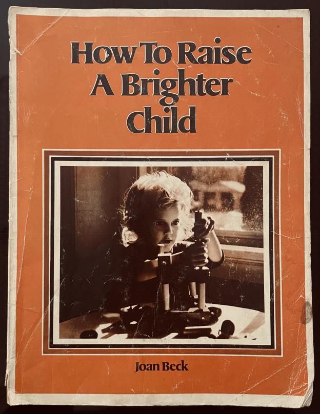 A book cover with an old photo of a child